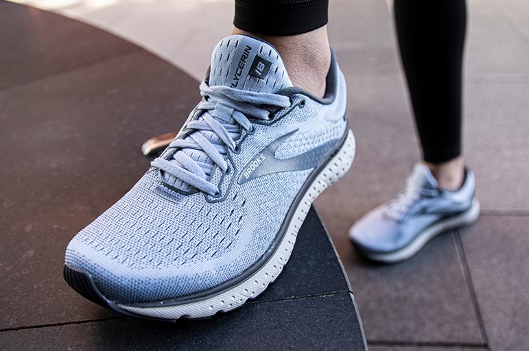 close up of woman's foot wearing a Brooks sneaker